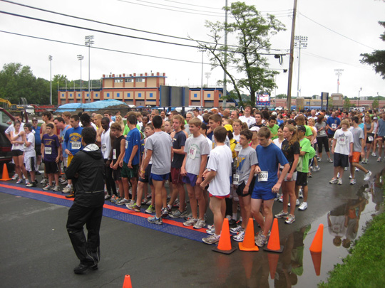 Runners straggle to the Rowley 5K start